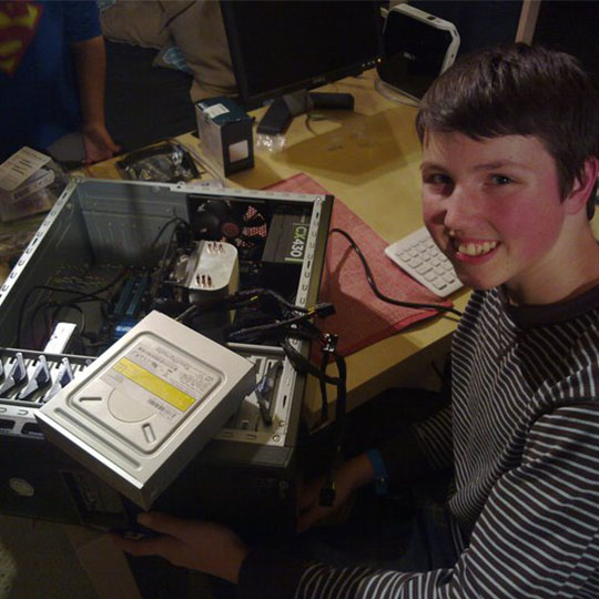 Me building my first PC, age 11.